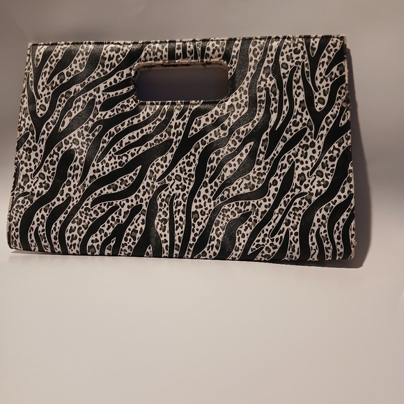 Zebra Print Clutch. Magnetic Snap Closures. - Picture 2 of 8